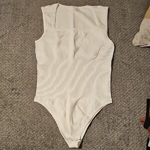 Elegant White Ribbed Women's Bodysuit